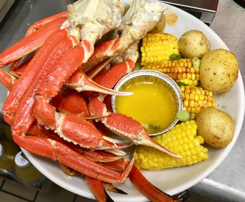 Boiled crawfish and Cajun seafood on a casual counter.