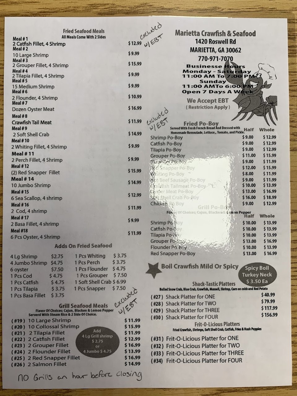 Boiled seafood, salads, and side dishes listed on screen.